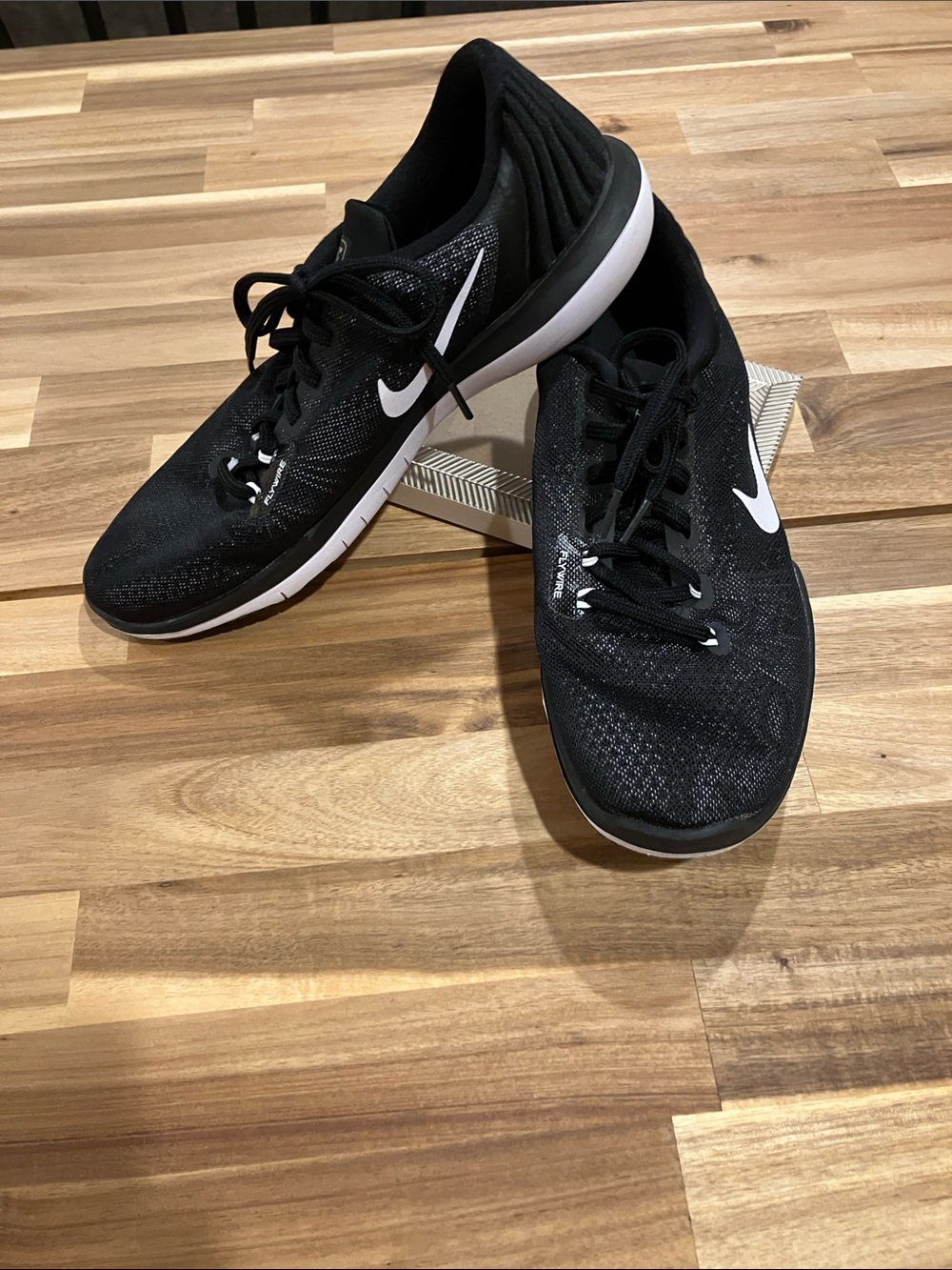 Nike Black Men’s Running Shoes with White Swoosh
